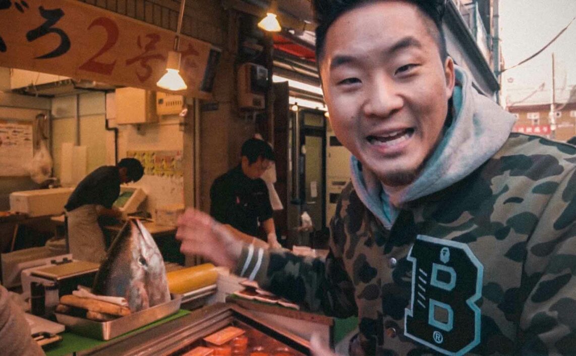 fung bros with a tuna head at Tsukiji fish market in Tokyo, Japan.